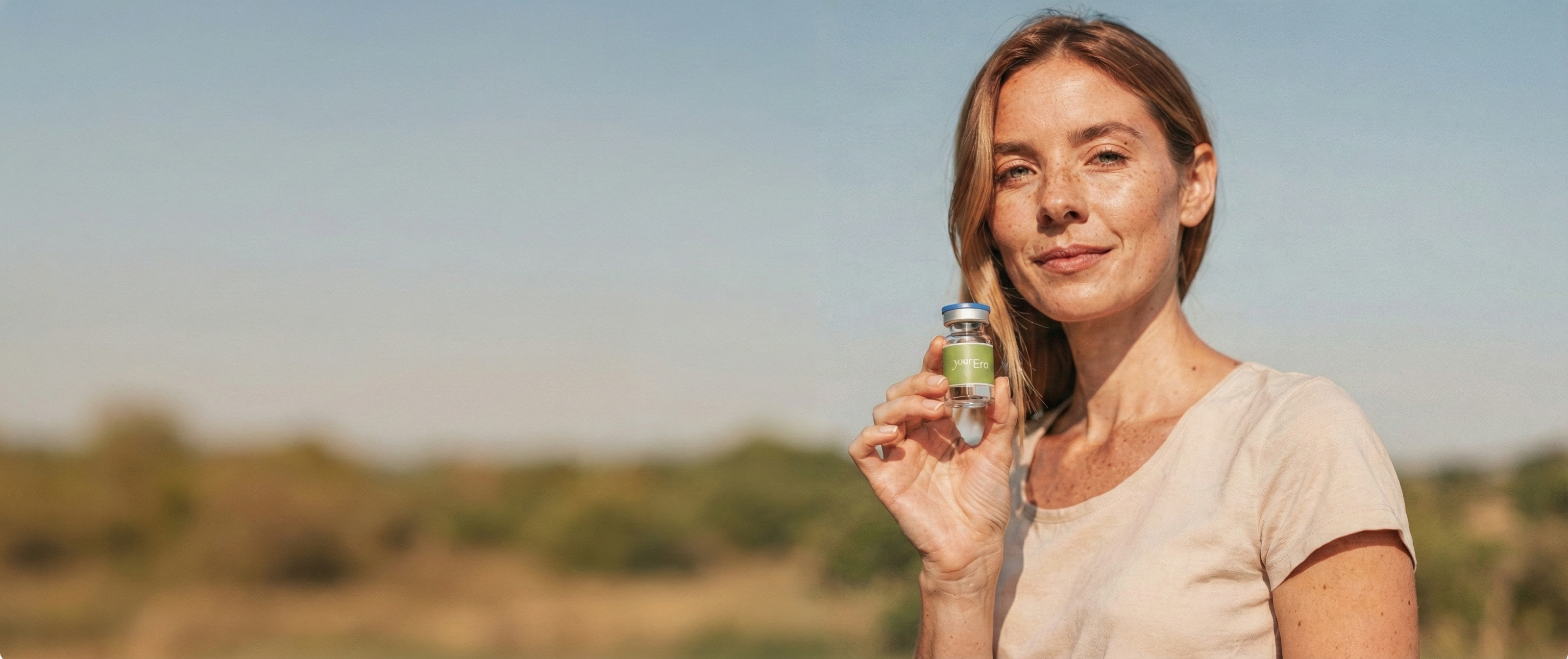 Woman holding yourEra vial