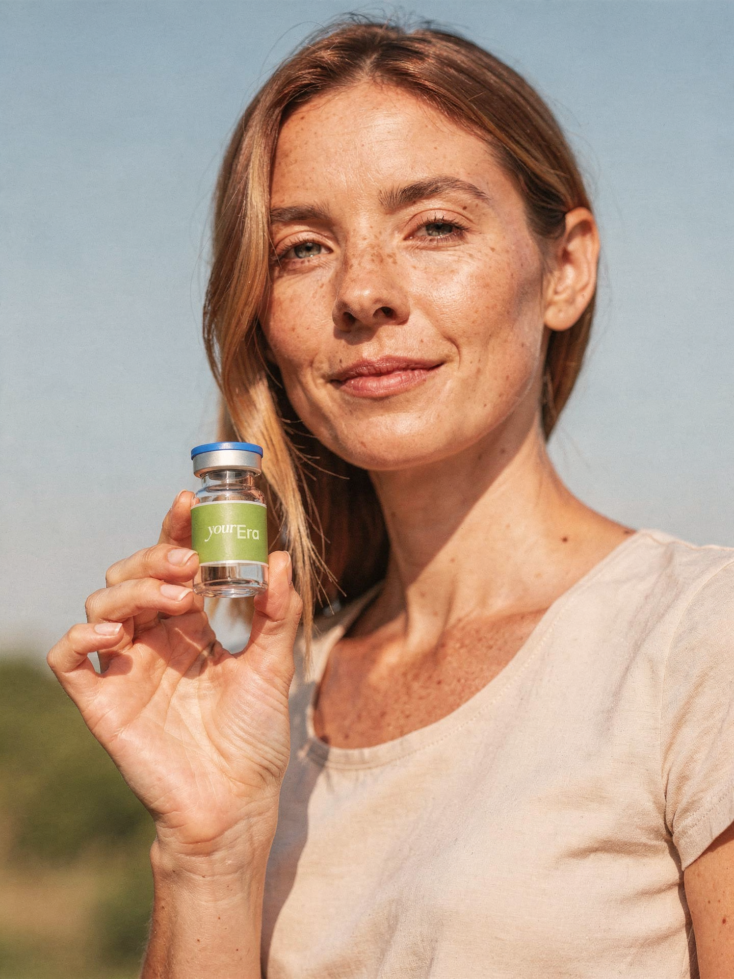 Woman holding yourEra vial